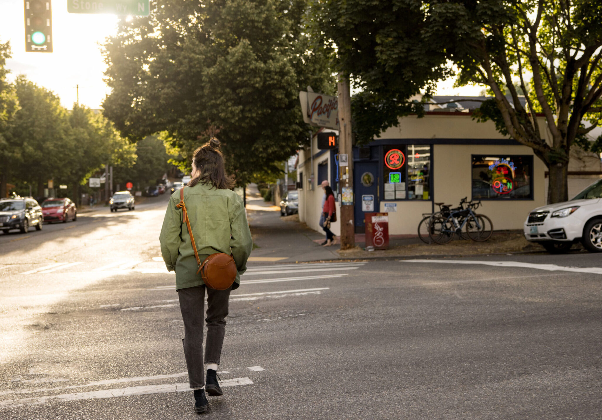 Person walking across the street at fremont seattle area
